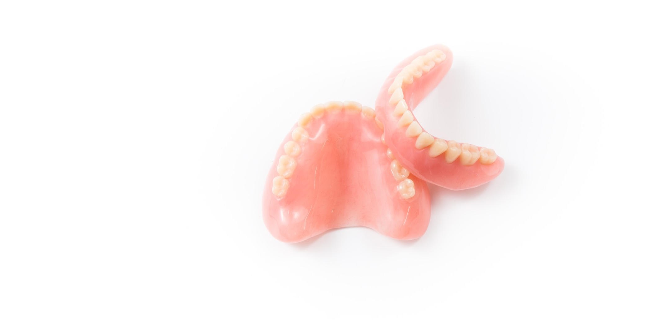 complete denture on white background