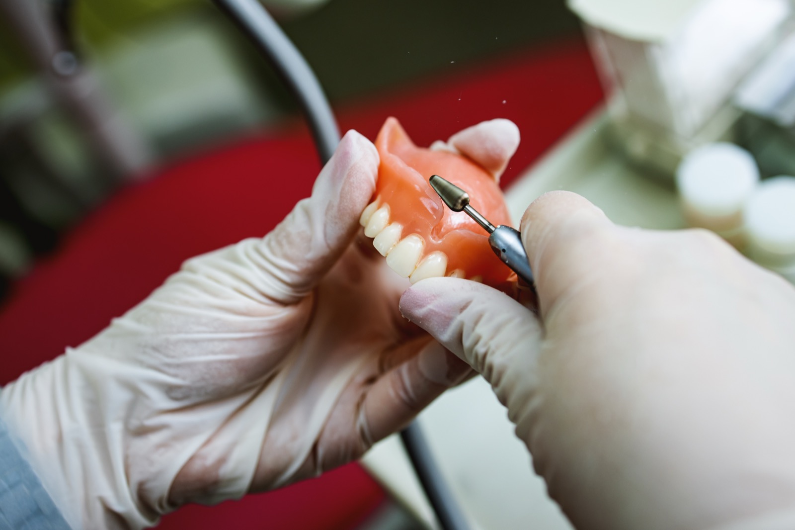 Close up of dentures being shaped