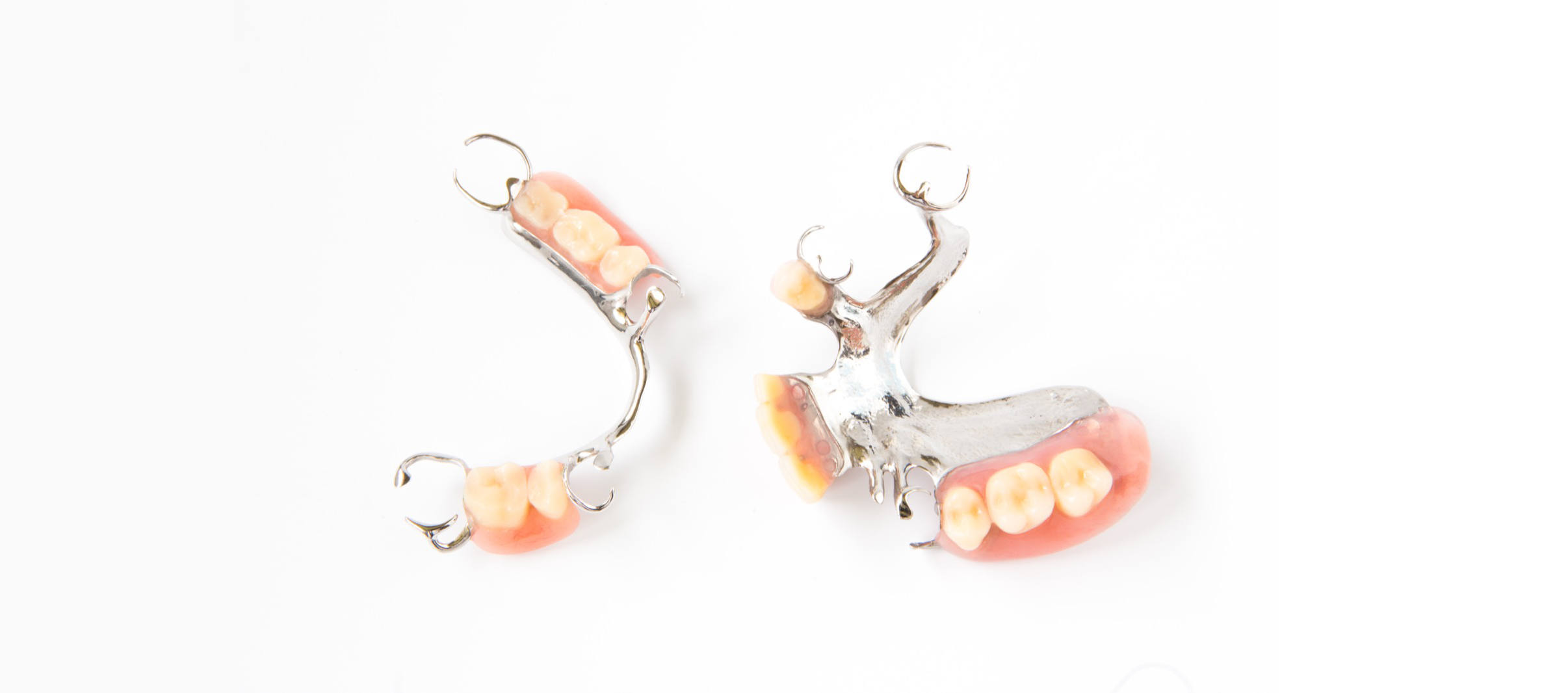 removable partial denture on white background.